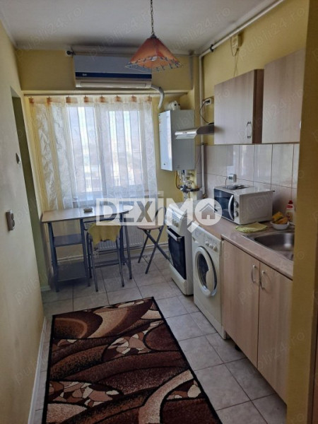 DACIA-APARTAMENT CU 2 CAMERE MOBILAT CENTRALA GAZE